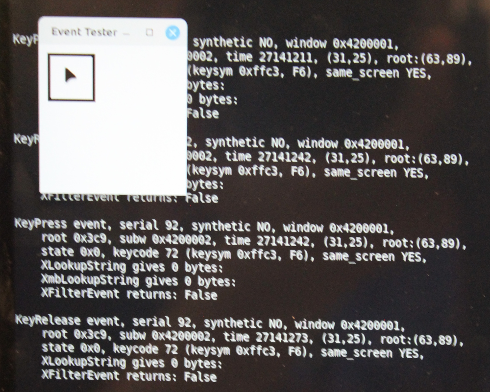 Running xev while probing ribbon cable.